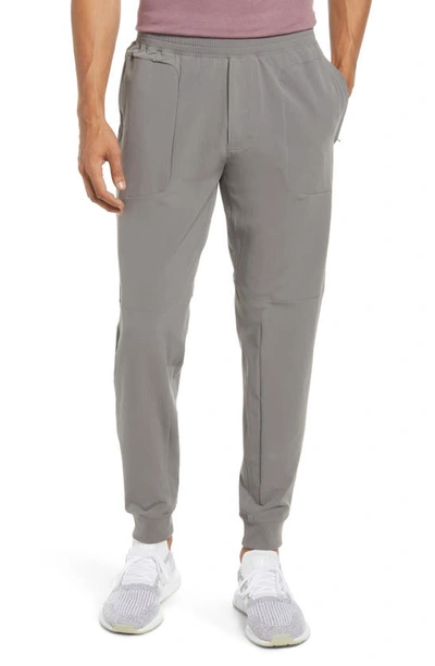 Shop Alo Yoga Co-op Pocket Tapered Joggers In Shadow Grey