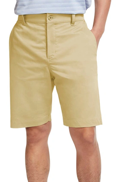 Shop Nike Dri-fit Uv Flat Front Chino Golf Shorts In Lemon Drop