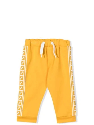 Shop Fendi Newborn Trousers With Ff Logo In Curry