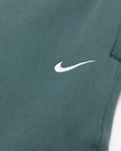 Shop Nike Nrg Solo Swoosh Fleece Pants In Green