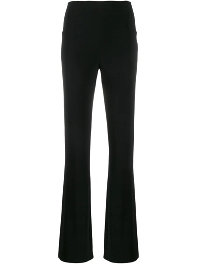 Shop Norma Kamali Trousers Black