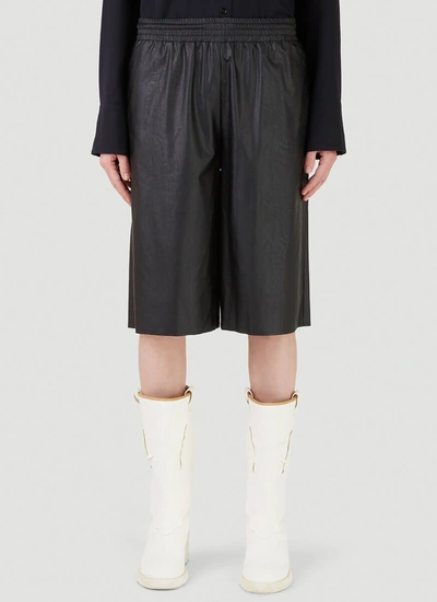 Shop Mm6 Maison Margiela Faux Leather Shorts In Black