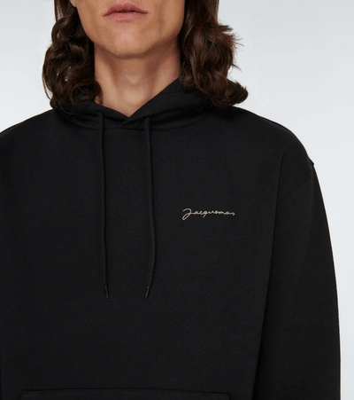 Shop Jacquemus Le Sweatshirt Brodé Hooded Sweatshirt In Black