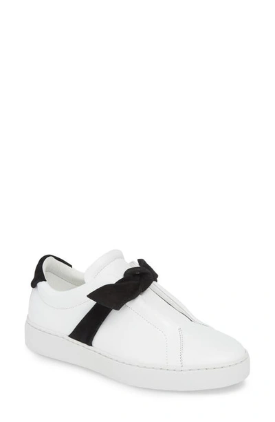 Shop Alexandre Birman Clarita Bow Sneaker In White/ Black