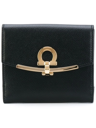 Shop Ferragamo Gancini Leather Wallet In Black