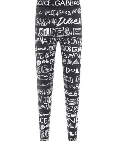 Shop Dolce & Gabbana Allover Logo Printed Leggings In Multi