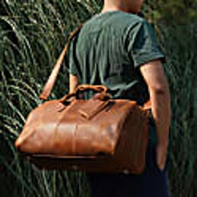 Touri Genuine Leather Duffle With Luggage Tag In Brown In In