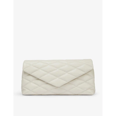 Shop Saint Laurent Womens Cream Sade Puffer Quilted Leather Clutch Bag