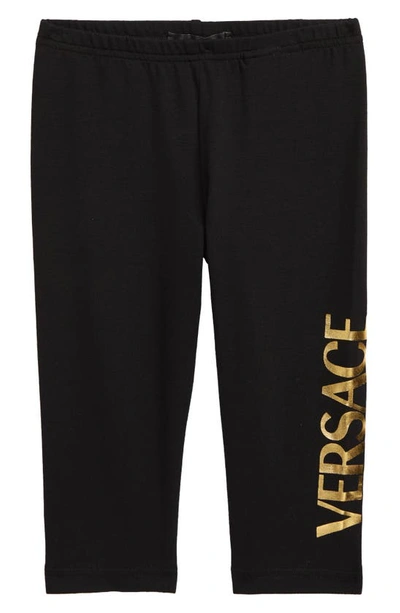 Shop Versace Logo Leggings In Black Gold