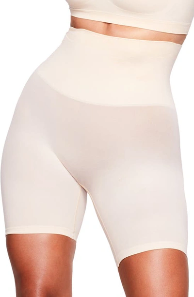 Skims Core Control Mid Thigh Shorts In Sand