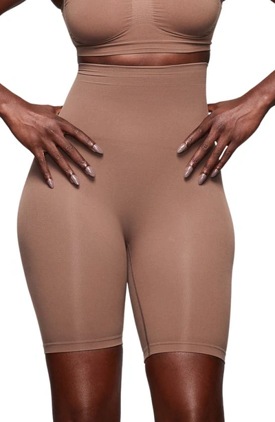 Skims Core Control Mid Thigh Shorts In Oxide