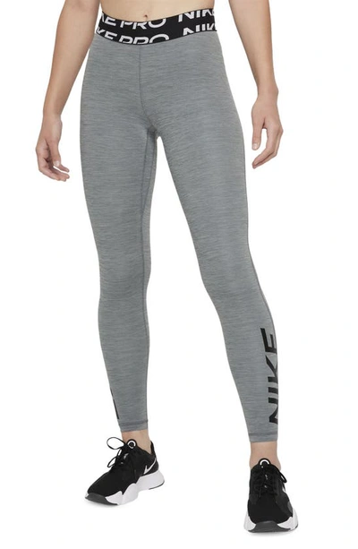 Shop Nike Pro Dri-fit Graphic Leggings In Smoke Grey/ Black
