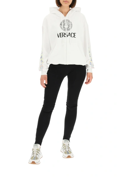 Shop Versace Logo Sweatshirt With Hoodie In White