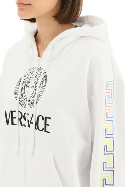 Shop Versace Logo Sweatshirt With Hoodie In White