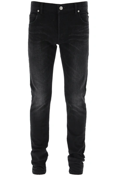 Shop Balmain Slim Jeans Embossed Logo In Black