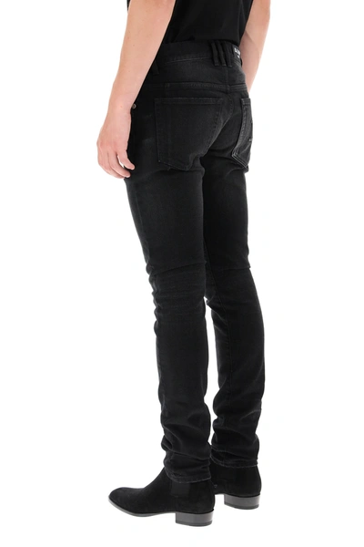 Shop Balmain Slim Jeans Embossed Logo In Black