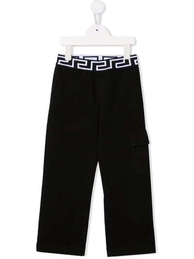 Shop Versace Greca-print Cotton Track Trousers In Black