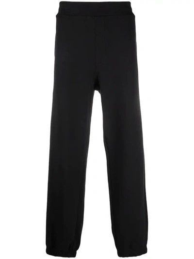 Shop Msgm Wide-leg Track Pants In Black