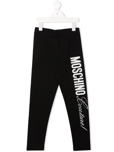 Shop Moschino Logo-print Leg Trousers In Black