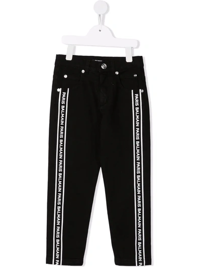 Shop Balmain Side Logo-print Trousers In 黑色