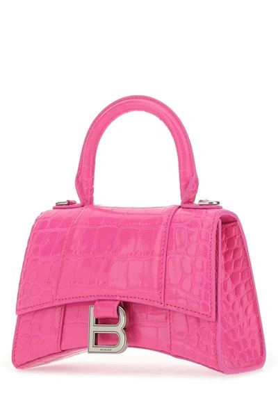 Shop Balenciaga Hourglass Embossed Top Handle Bag In Pink