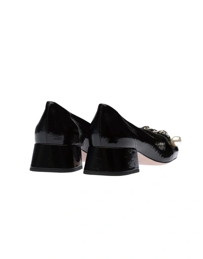 Shop Miu Miu Flat Shoes Black