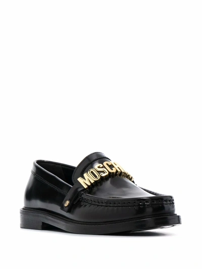 Shop Moschino Flat Shoes Black