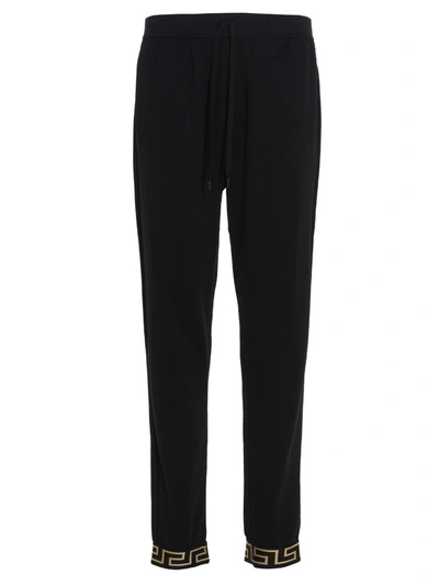 Shop Versace Greca Detailed Drawstring Track Pants In Black