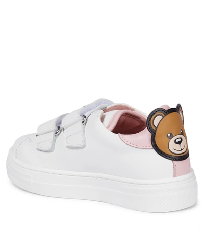 Shop Moschino Leather Sneakers In White