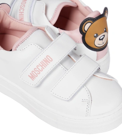 Shop Moschino Leather Sneakers In White