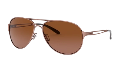Shop Oakley Caveat™ Sunglasses In Gold