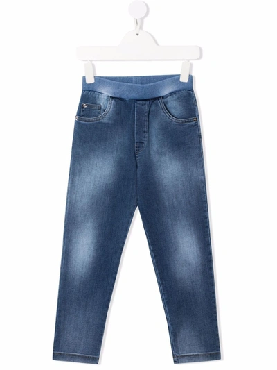 Shop Versace Elasticated Denim Jeans In 蓝色