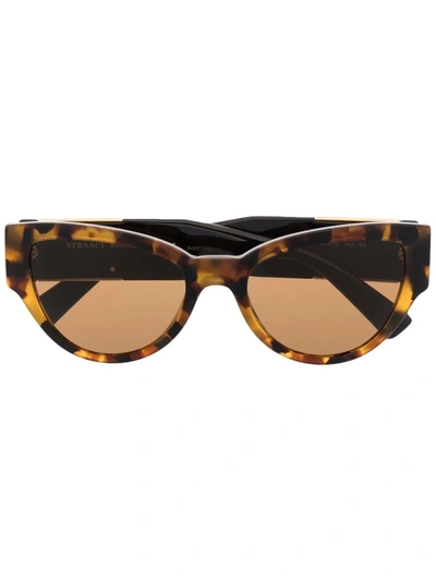 Shop Versace Tortoiseshell Cat-eye Sunglasses In Braun