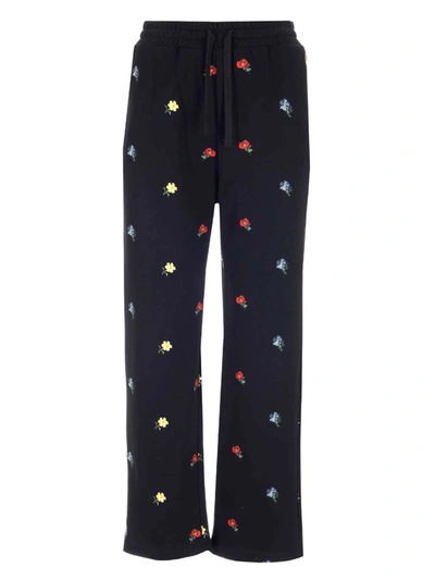 Shop Red Valentino Floral Patches Jersey Pants In Black