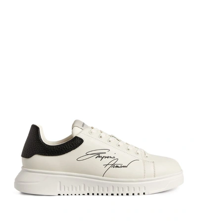 Shop Emporio Armani Leather Signature Sneakers In White