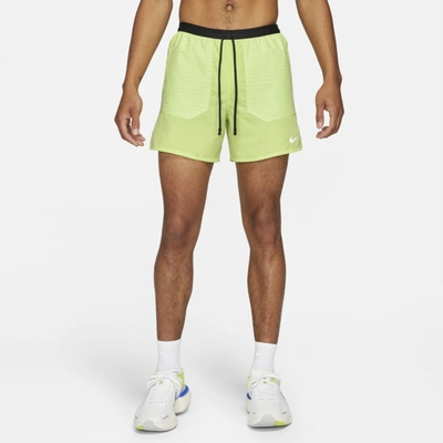 Shop Nike Dri-fit Flex Stride Run Division Men's Brief-lined 5" Running Shorts In Light Lemon Twist