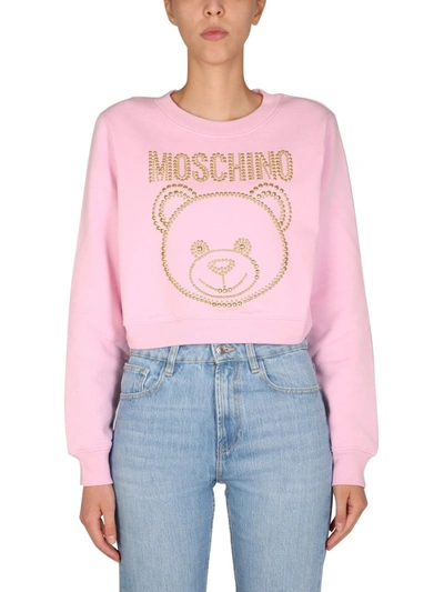 Shop Moschino Cropped Sweatshirt In Pink