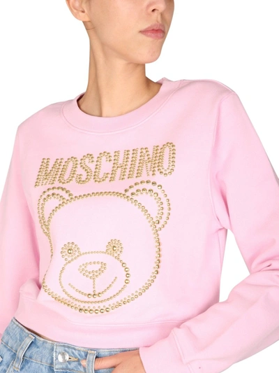 Shop Moschino Cropped Sweatshirt In Pink