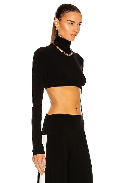 Norma Kamali Cropped Slim Fit Long Sleeve Turtleneck Top In Black