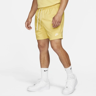 Shop Nike Sportswear Men's Woven Flow Shorts In Saturn Gold,white