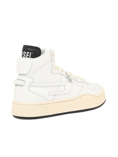 Shop Diesel Ukiyo Mid High Top Sneakers In White
