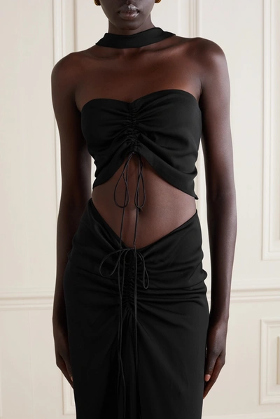 Shop Christopher Esber Ruched Cutout Woven Halterneck Maxi Dress In Black