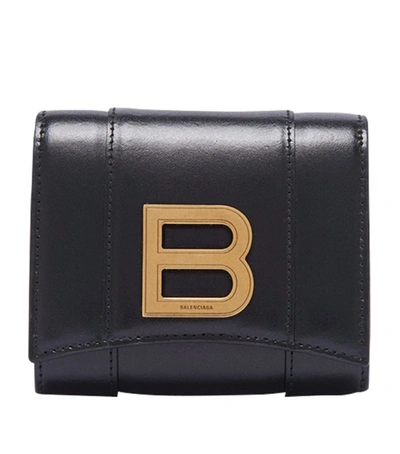 Shop Balenciaga Leather Compact Hourglass Wallet In Black