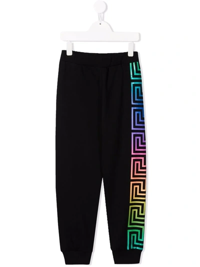 Shop Versace Greca-print Cotton Track Trousers In Black