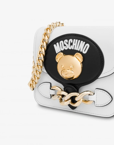 Shop Moschino Teddy Stud Shoulder Bag In Black