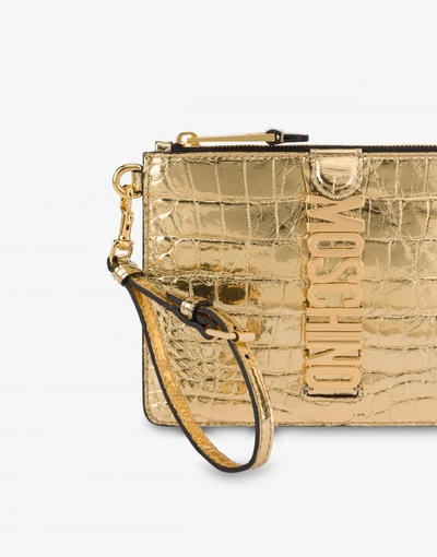 Shop Moschino Couture Biker Laminated Clutch In Gold