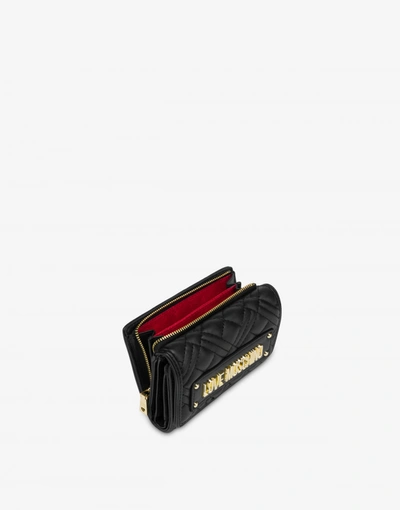 Shop Love Moschino Shiny Quilted Wallet In Black