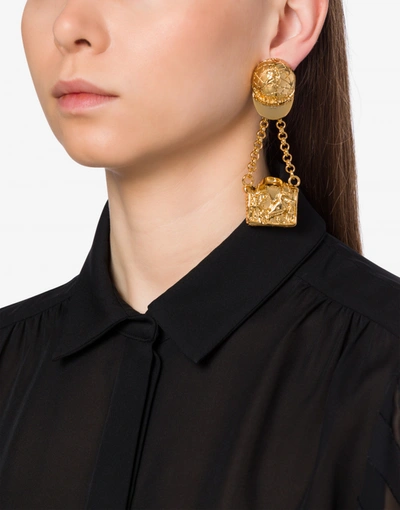 Shop Moschino Biker Bag Clip Earrings In Gold