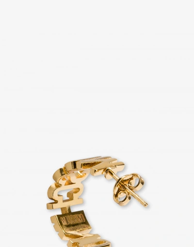 Shop Moschino Lettering Logo Earrings In Gold