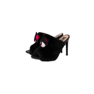 Shop Moschino Eyes High Mules In Black